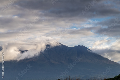 Mount Taranaki high in the air. Taranaki, New Zealand