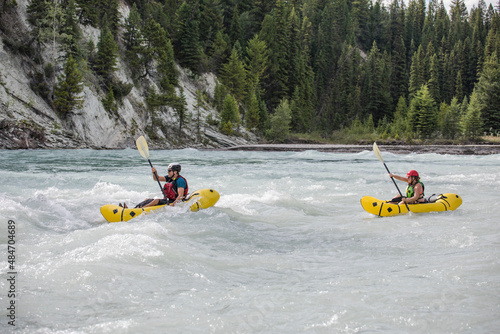 Man and woman paddling in British Columbia, Canada. photo