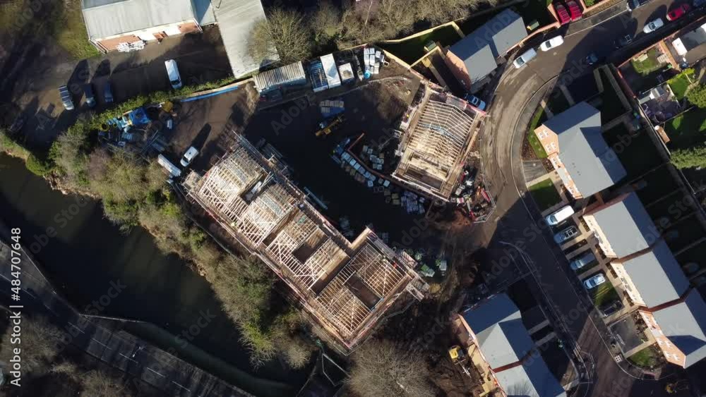Aerial view of British housing development with roof trusses and materials Aerial view of British housing development with roof trusses and materials