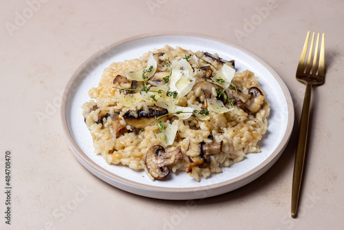 Risotto with mushrooms, cheese and thyme. Vegetarian food. Italian food.