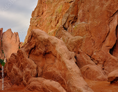 Red and orange sandstone cliffs in late afternoon light in Garden of the Gods Colorado Springs