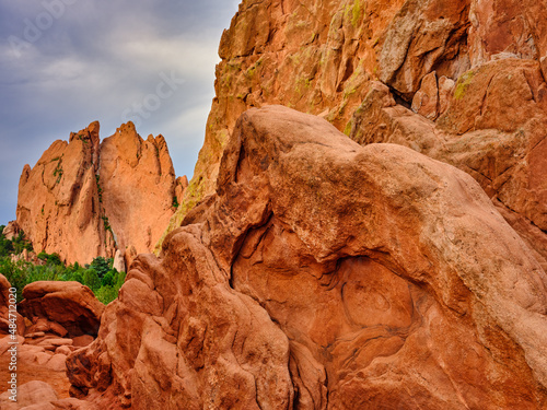 Red and orange sandstone cliffs in late afternoon light in Garden of the Gods Colorado Springs