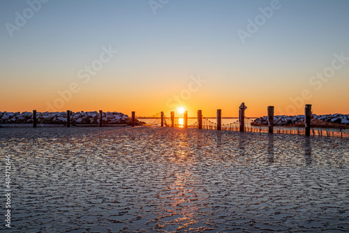 Sub-freezing sunrise with ice on the water