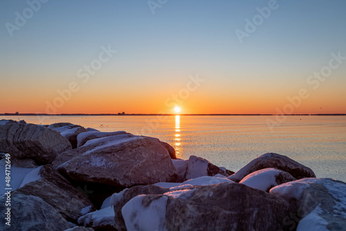 Sub-freezing sunrise with a snow dusting on the rocks