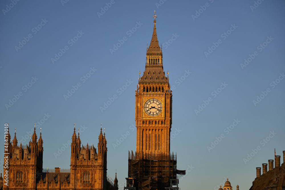 Big Ben at dawn from the south bank of the river Thames, golden hour