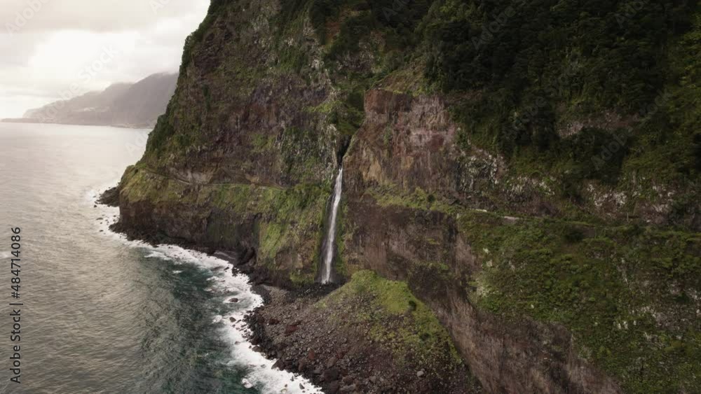 High waterfall at coast cliff of Madeira Island High waterfall at coast cliff of Madeira Island
