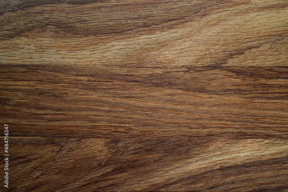 Dark wooden texture with beautiful wood grain pattern may be used as background Dark wooden texture with beautiful wood grain pattern may be used as background