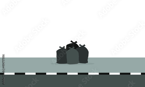 Garbage bags on the sidewalk on a white background