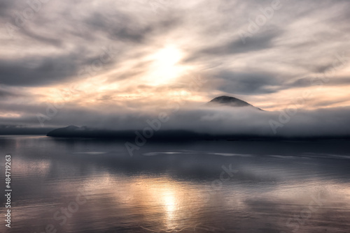 Scenic Canadian Nature View on the Pacific West Coast during cloudy and foggy winter day. Howe Sound  between Vancouver and Squamish  British Columbia  Canada. Artistic Render