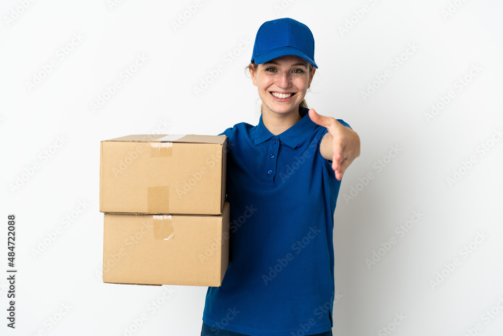 Young delivery woman isolated on white background shaking hands for closing a good deal Young delivery woman isolated on white background shaking hands for closing a good deal