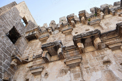 beautiful decoration of inner facade of well preserved Roman theatre in ancient city Aspendos, Turkey photo