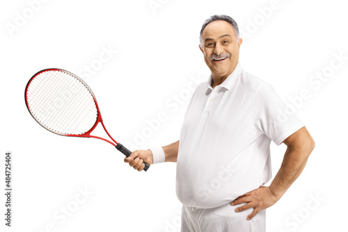 Happy mature man holding a tennis racket with one hand