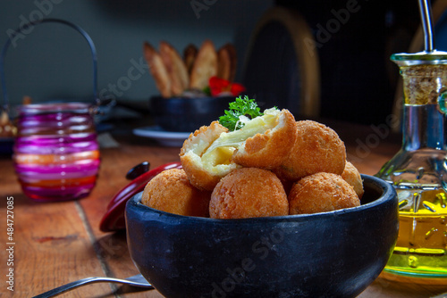Fried rice balls. Traditional from Brazil where it is called Bolinho de arroz. photo