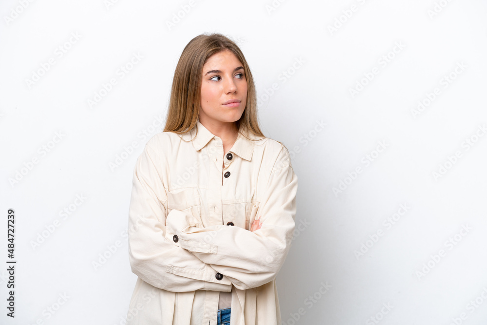 Young caucasian woman isolated on white bakcground keeping the arms crossed Young caucasian woman isolated on white bakcground keeping the arms crossed