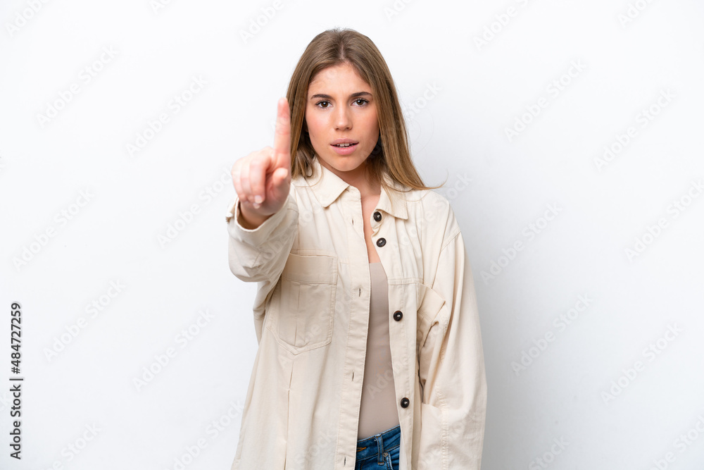 Young caucasian woman isolated on white bakcground counting one with serious expression Young caucasian woman isolated on white bakcground counting one with serious expression