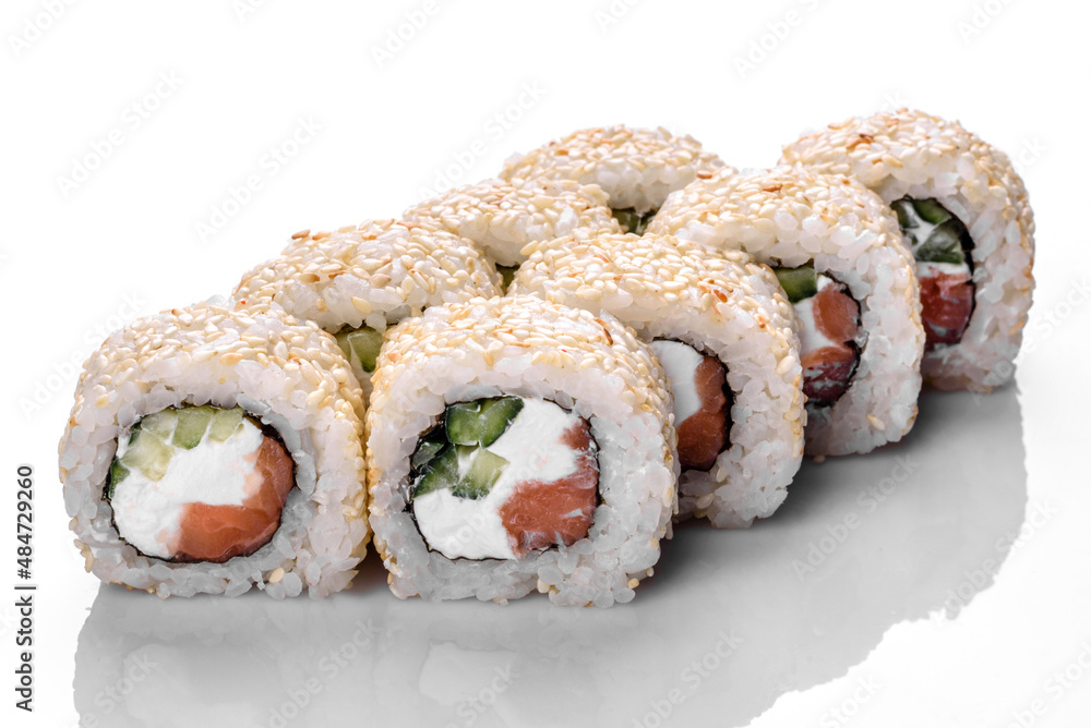 Traditional delicious fresh sushi roll set on a white background Traditional delicious fresh sushi roll set on a white background