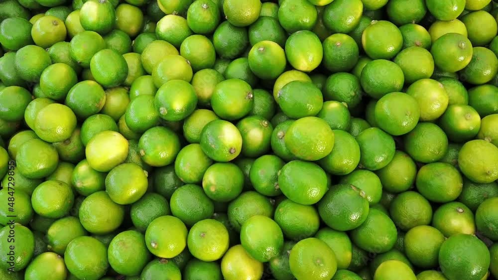 Close up of Persian limes on display on a market stall. Real time, zoom out. Close up of Persian limes on display on a market stall. Real time, zoom out.