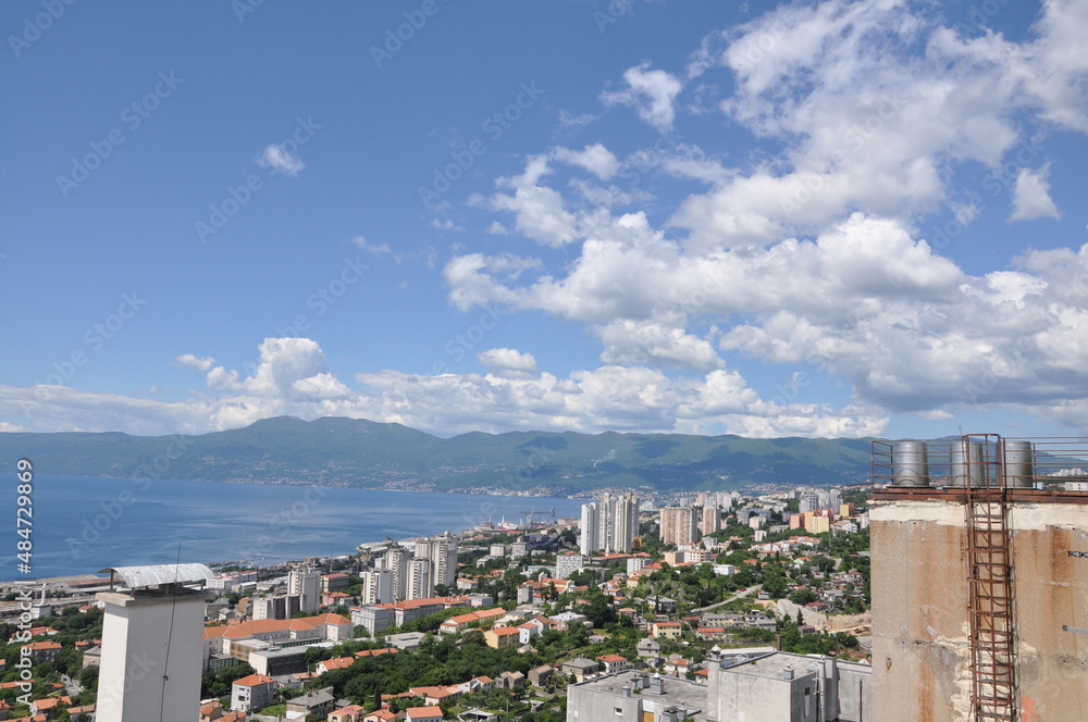 Panoramic view on Rijeka city and gulf with black clouds and Adriatic Sea
