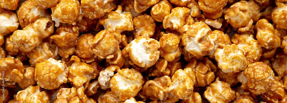 Homemade Caramel Popcorn, top view. Flat lay, overhead, from above. Homemade Caramel Popcorn, top view. Flat lay, overhead, from above.