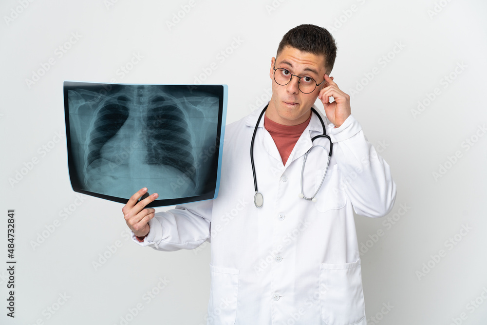 Professional traumatologist on white background thinking an idea Professional traumatologist on white background thinking an idea