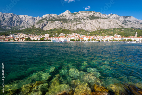 view on Makarska town and Biokovo mountains from adriatic sea in Dalmatia region in Croatia