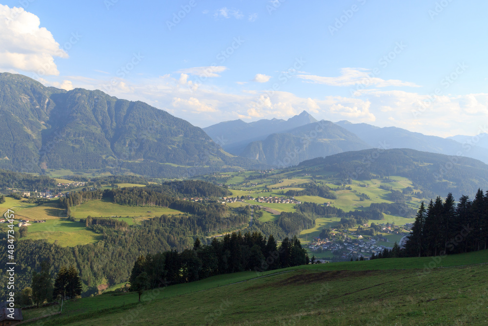 Fototapeta premium Panorama view with alpine mountains and blue sky in Salzburgerland, Austria