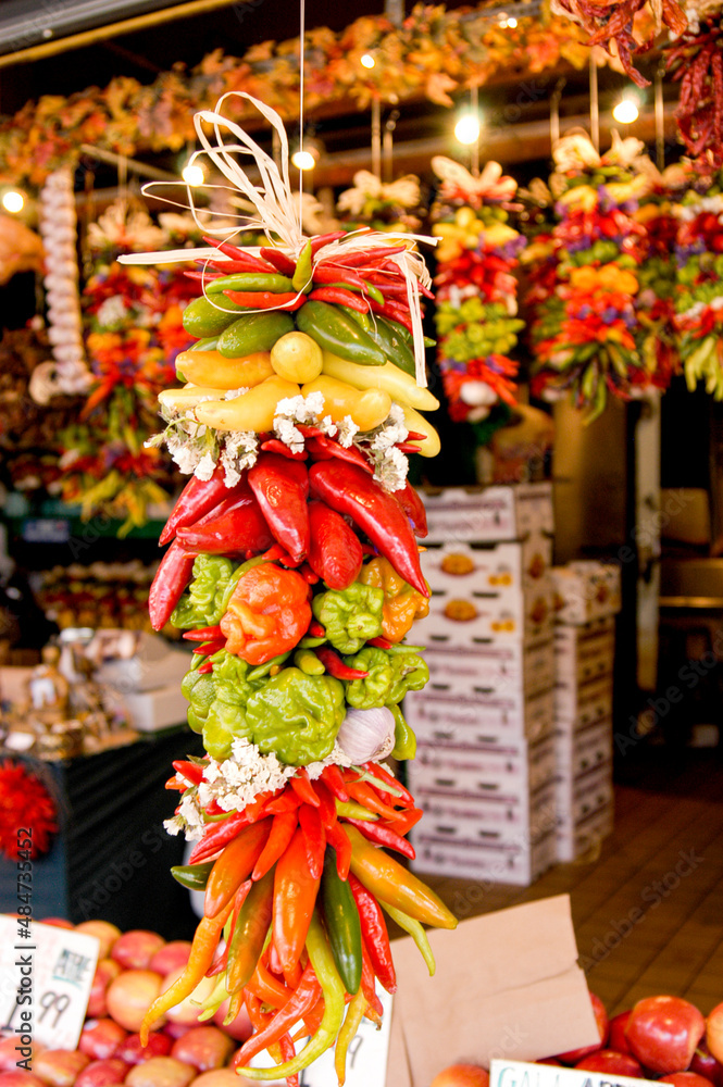 Colorful assortment of hanging peppers  