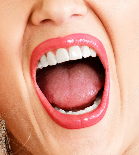 Open mouth of a woman  white healthy teeth