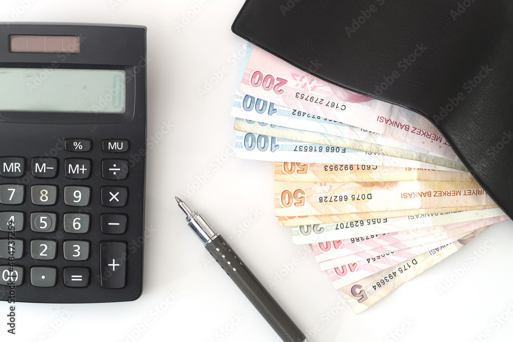 Turkish lira with a Calculator and a Pen Stock Photo | Adobe Stock