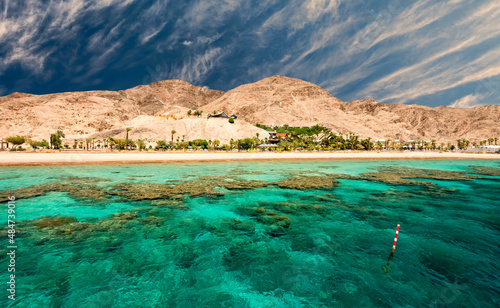 Beautiful coral reefs of the Red Sea, sandy beaches, small tourist hotels and...