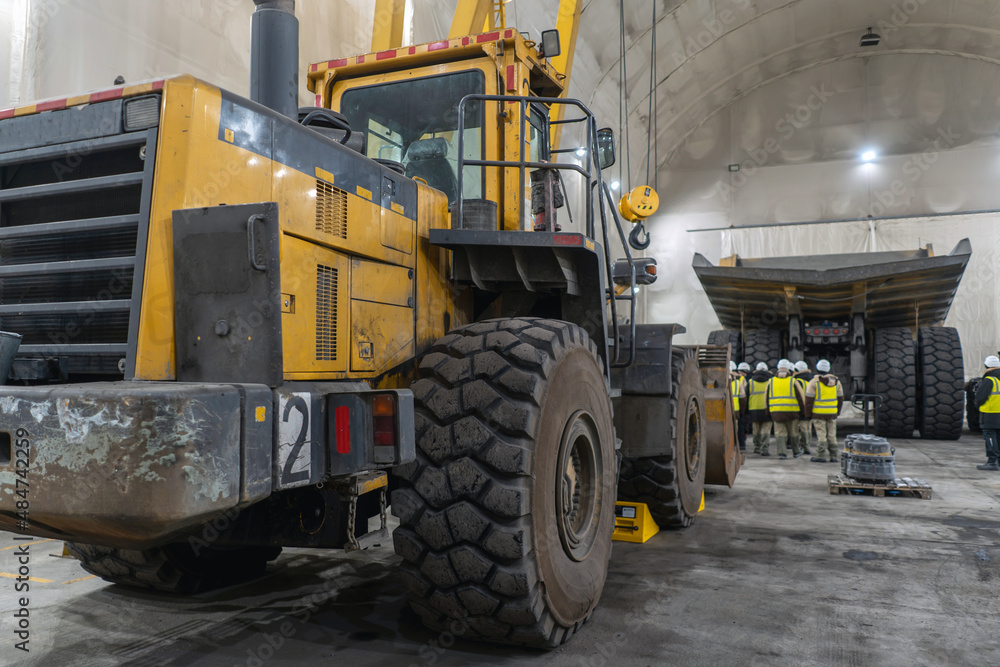 Obraz premium The loader is serviced at the industrial garage.