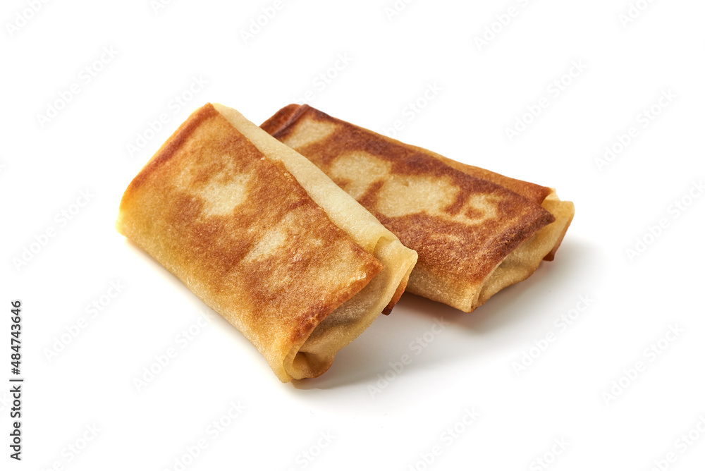 Stuffed pancakes, meat crepes, isolated on white background. Stuffed pancakes, meat crepes, isolated on white background.
