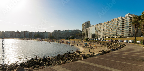 Montevideo, Uruguay - 11th January 2022 - Beautiful sunset on Pocitos beach with bathers on a summer day in Montevideo Uruguay. photo