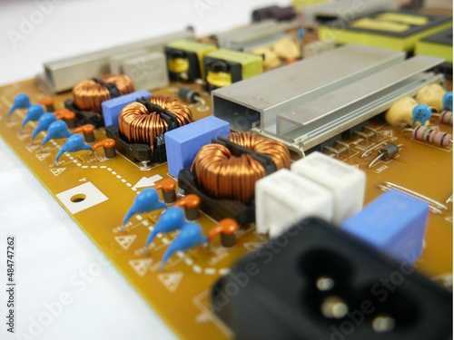 Tableau sur toile Copper wire coil on a printed circuit board, close up