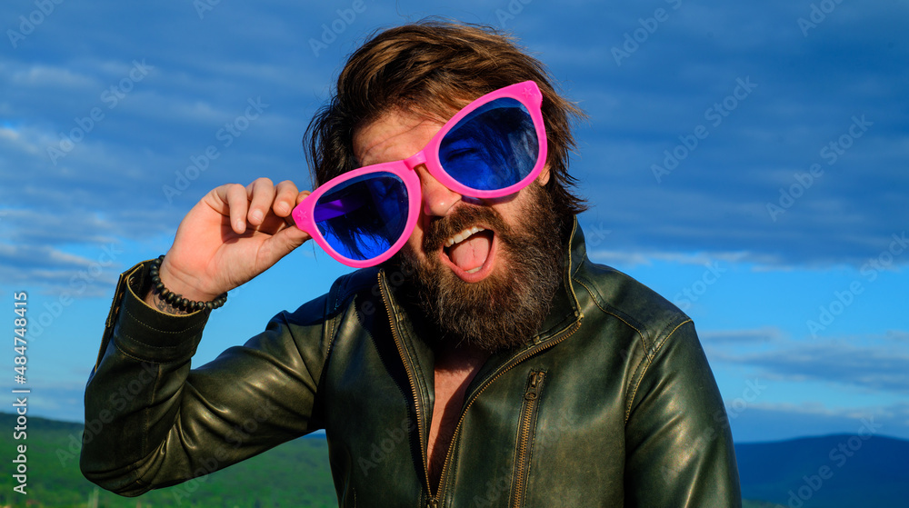 Bearded man in big glasses outdoors. Hipster with beard and mustache in funny big eyeglasses. Bearded man in big glasses outdoors. Hipster with beard and mustache in funny big eyeglasses.