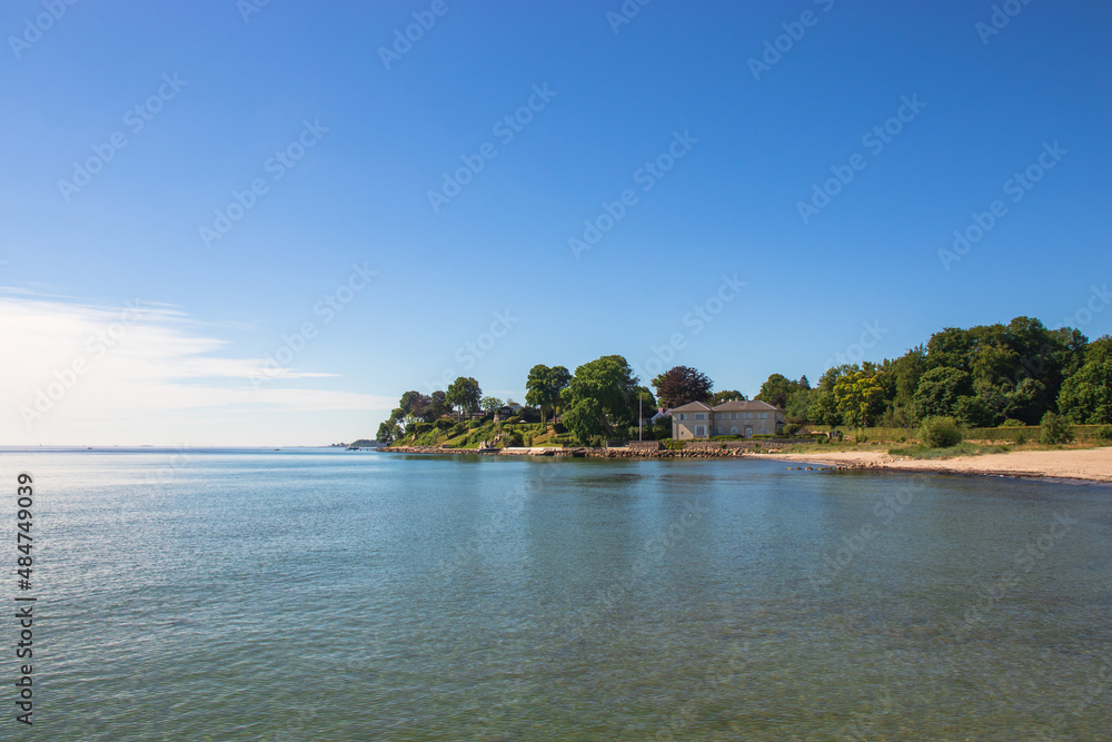 Coastline with houses at the Danish coast.