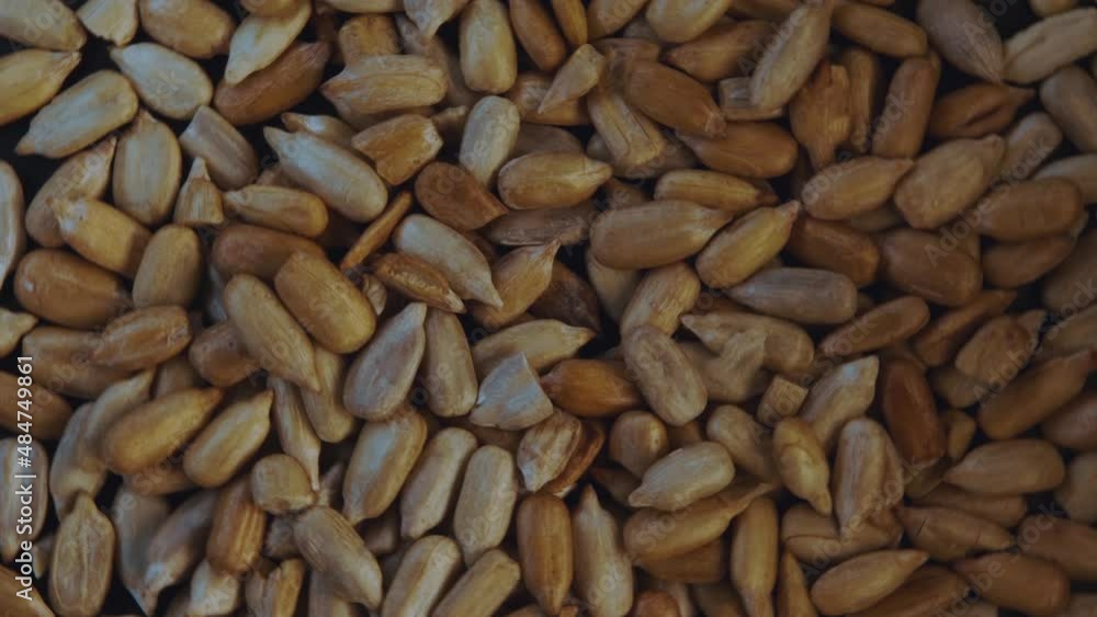 Macro photography of peeled sunflower seeds in close-up Macro photography of peeled sunflower seeds in close-up
