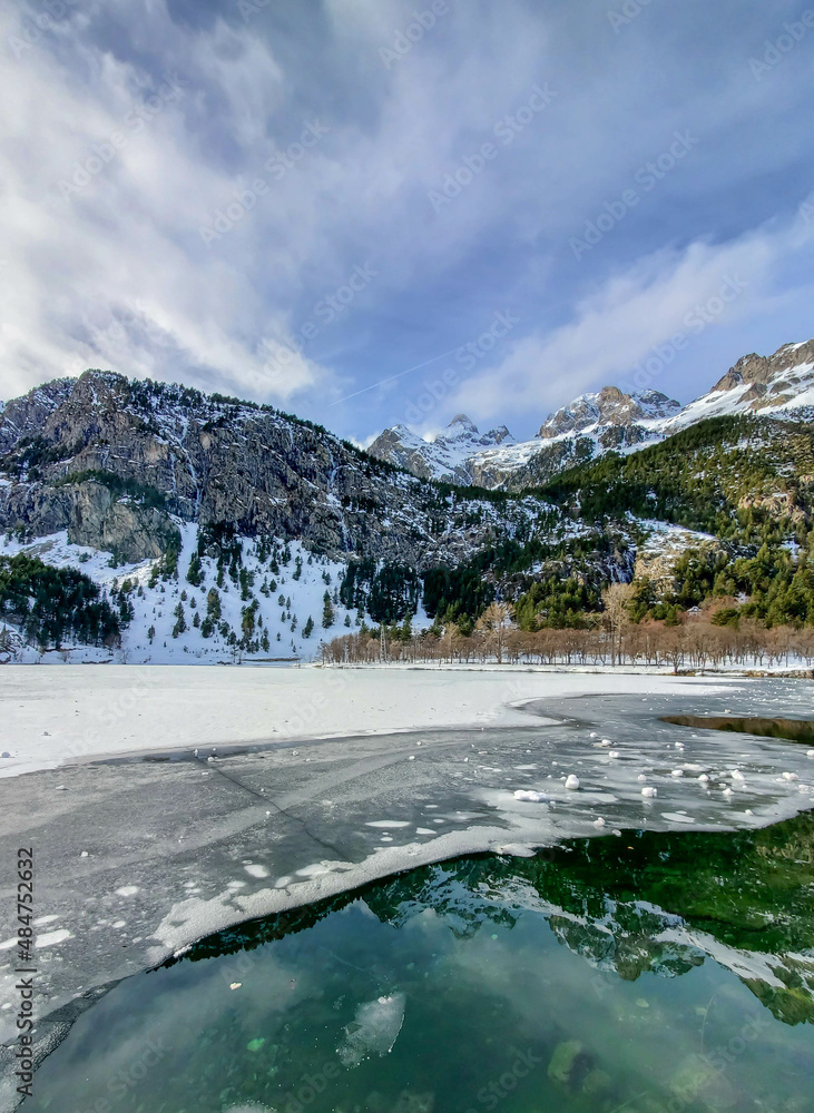 Snowy mountain with a frozen lake in the Pyrenees