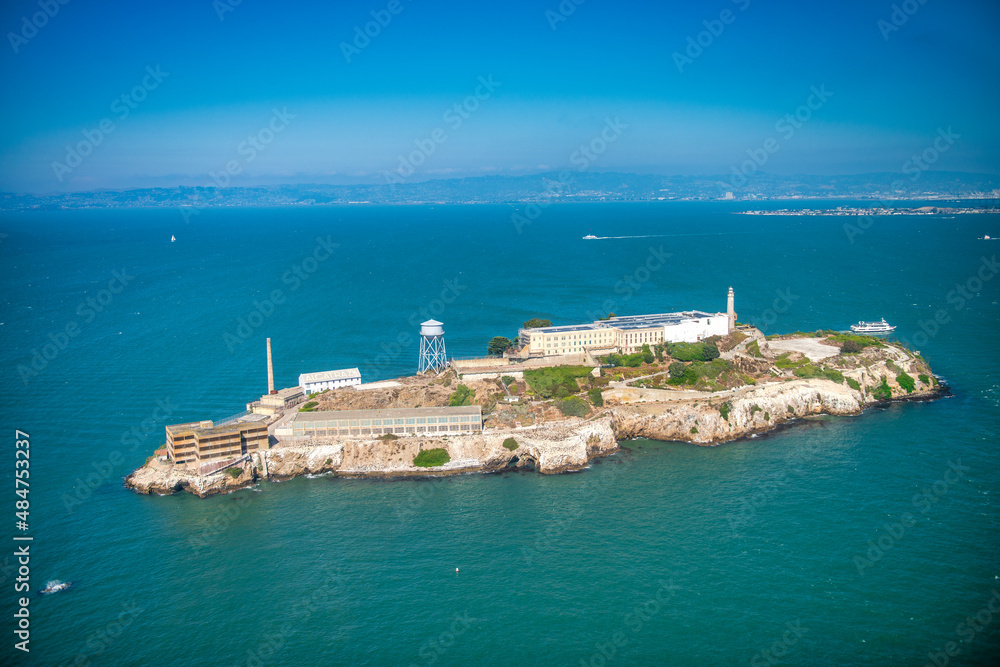 Alcatraz Island and Prison, aerial view from helicopter on a clear sunny day.