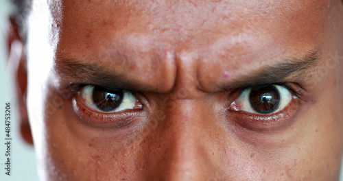 Photography Man has a serious look on his face