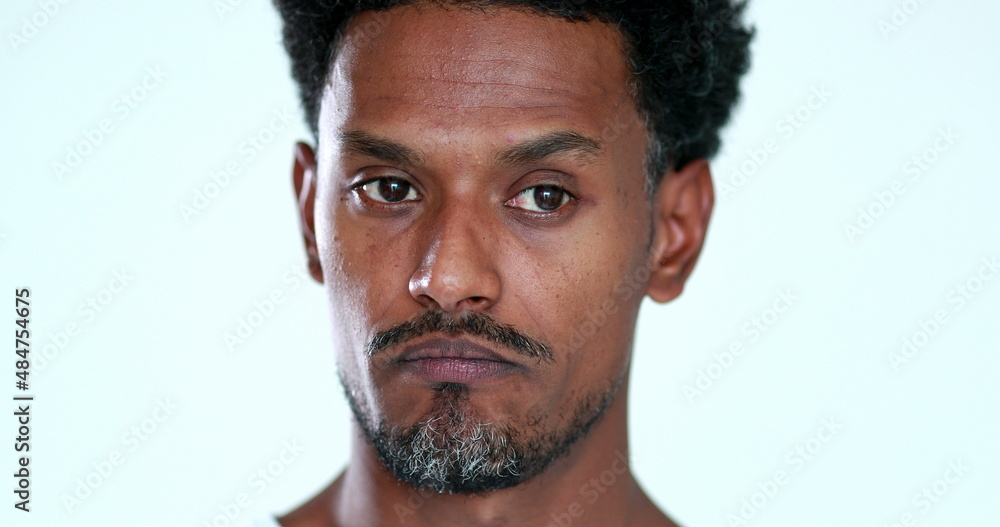 Obraz premium Clueless person thinking portrait face. Doubtful pensive african american man