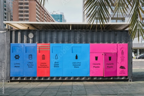 Separate collection facilities for garbage collection. Waste recycling concept. Containers for metal, glass, paper, organics, plastic for further processing of garbage in Abu Dhabi,UAE.  photo