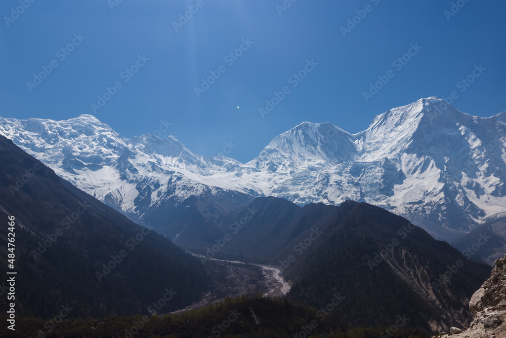View of snow-capped mountain peaks in the Himalayas Manaslu region View of snow-capped mountain peaks in the Himalayas Manaslu region