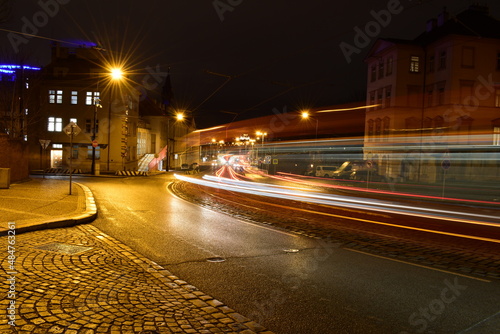 Night city landscape, traffic passing through the street, long exposure