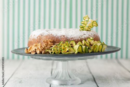 Obraz na płótnie A zucchini and walnut cake decorated with ingredients w salonie