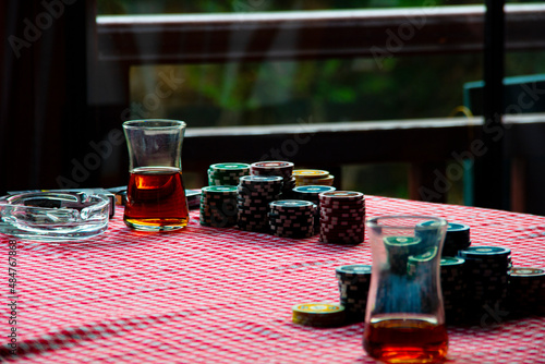 teacups on the poker table