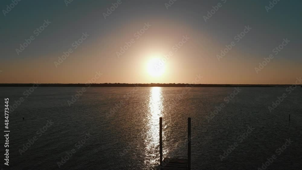 Flying over the sea in sunrise. Aerial drone view. High quality 4k footage Flying over the sea in sunrise. Aerial drone view. High quality 4k footage