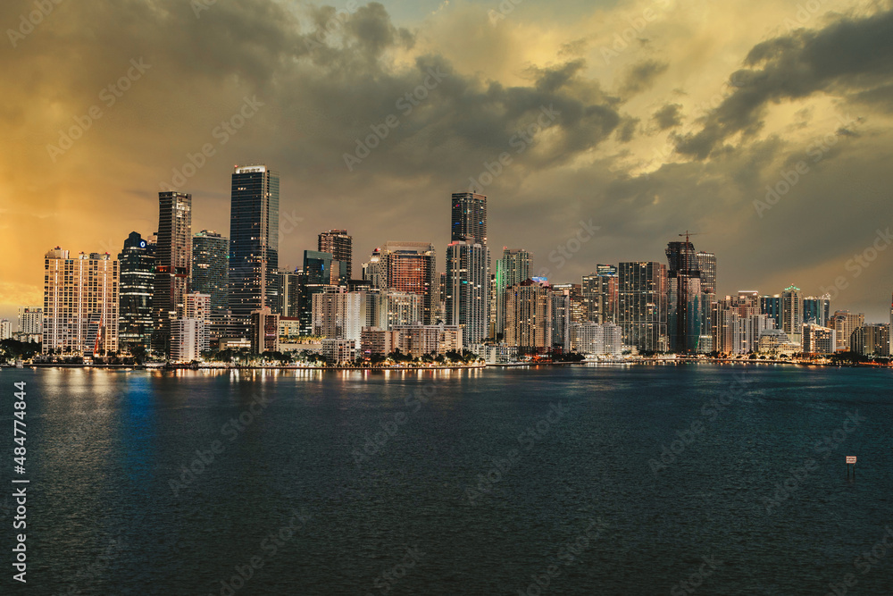 Naklejka premium city skyline at sunset beautiful miami buildings sea sky skyscrapers luxury business urban Brickell downtown florida usa 