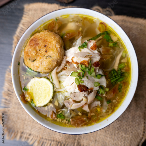 Soto Ayam is a traditional Indonesian soup mainly composed of broth, chicken and vegetables