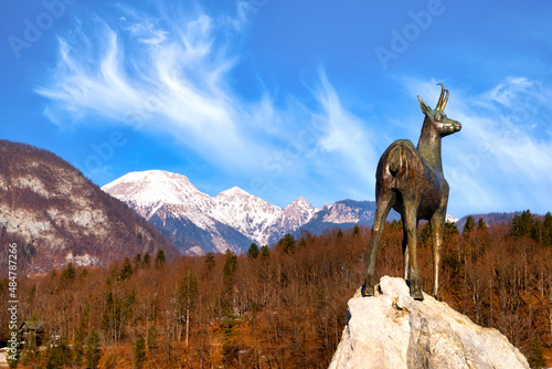 Sculpture on the beautiful lake Bohinj in Triglav national park on a sunny winter day